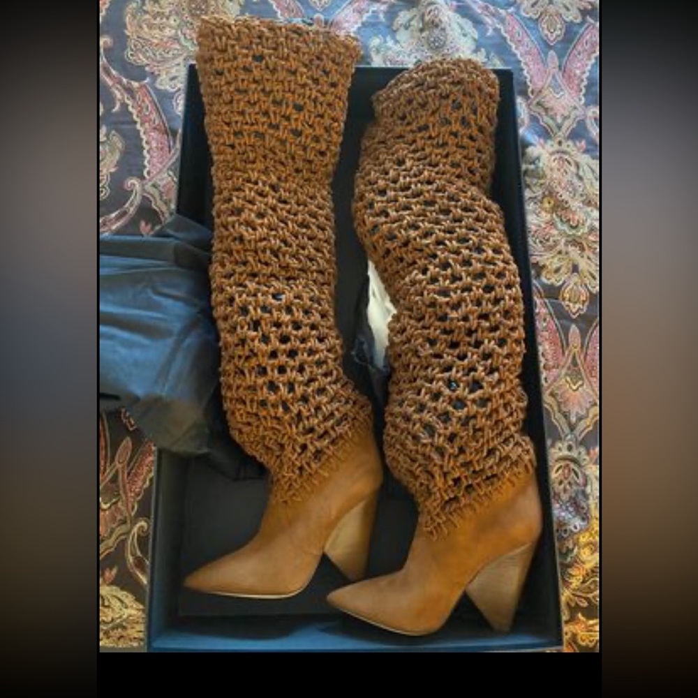 Brand new Yves Saint Laurent boots. New with tabs and in original box.Size 38